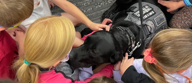 Therapy Dog Encourages Students to Read and Write